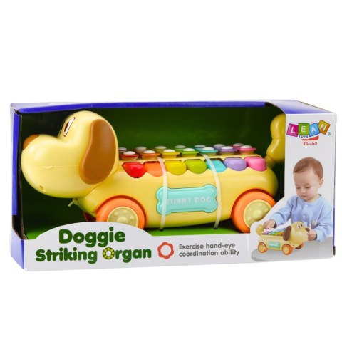 Jeżdżący Piesek Cymbałki Ruchome Uszy Ogon Pałeczka Na Sznurku LEAN Toys